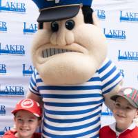 Louie the Laker poses with two young boys